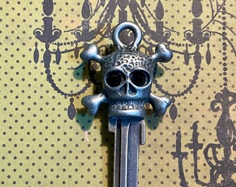 skull and crossbones key blank with jet black Swarovski crystal eyes