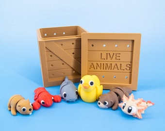 Pocket Pals Freshwater Friends – Mini River & Pond Animal Set + “LIVE ANIMALS” Crate (Axolotl, Otter, Catfish, Beaver, Frog, Lobster, Duck)
