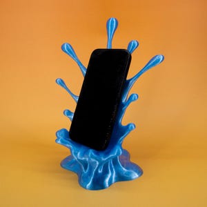 Colorful Desktop Phone Stand Splash – Unique 3D Printed Water Burst Holder for Desk, Fits Apple iPhone, Cool Desk Accessory w/ Charger Slot