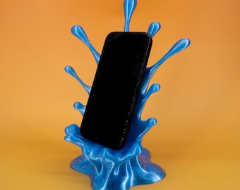 Soporte colorido para teléfono de escritorio Splash: soporte único con impresión 3D de agua para escritorio, compatible con iPhone de Apple, accesorio de escritorio genial con ranura para cargador