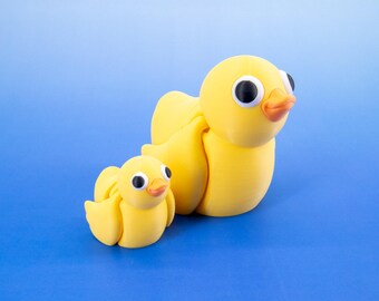 Knikspeeltje eend: 3D-geprint minidier, flexibel geel figuur, stressverlichte bureaustoel