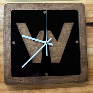 Custom "W" Clock made with plywood and colored acrylic plates