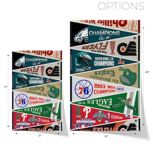 May include: Unframed wall art options featuring Philadelphia sports team pennants. The pennants include the Eagles, Flyers, Phillies, and 76ers, with championship years and logos. The larger piece is 24 inches tall and 16 inches wide.