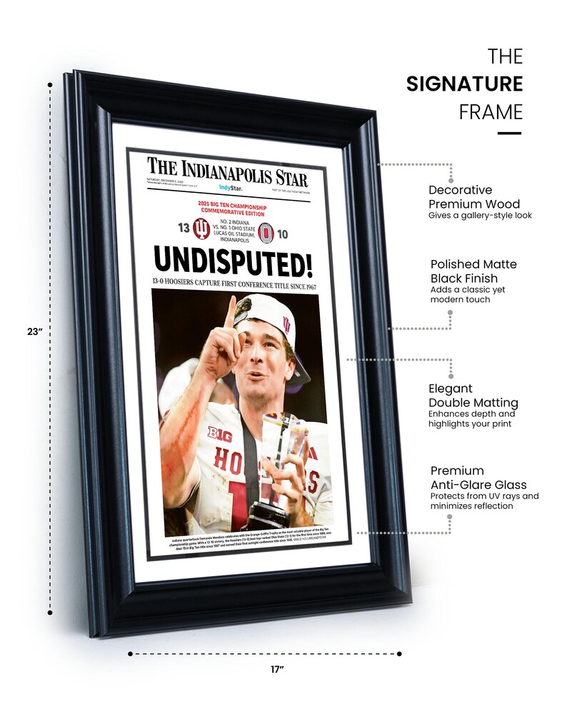 May include: A framed newspaper front page from The Indianapolis Star, commemorating a sports victory. The black frame measures 17 inches wide and 23 inches tall. The headline reads "UNDISPUTED!" with a photo of a player holding a trophy.