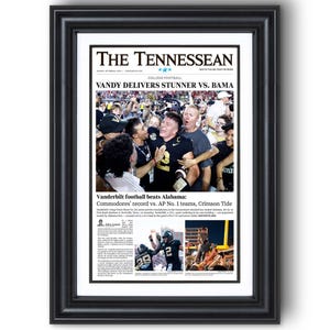 May include: A black and white newspaper front page with the headline "VANDY DELIVERS STUNNER VS. BAMA". The article is about Vanderbilt's football team beating Alabama. There are two smaller photos of the game.