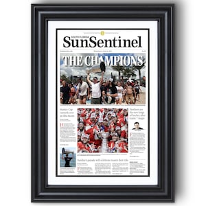 2024 Florida Panthers Stanley Cup &quot;THE CHAMPIONS!&quot; Framed Newspaper Print