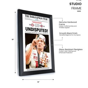 May include: A framed print of The Indianapolis Star newspaper, commemorating a sports victory. The black frame measures 19 inches high and 13 inches wide. The print features a photo of a player holding a trophy, with the headline "UNDISPUTED!"