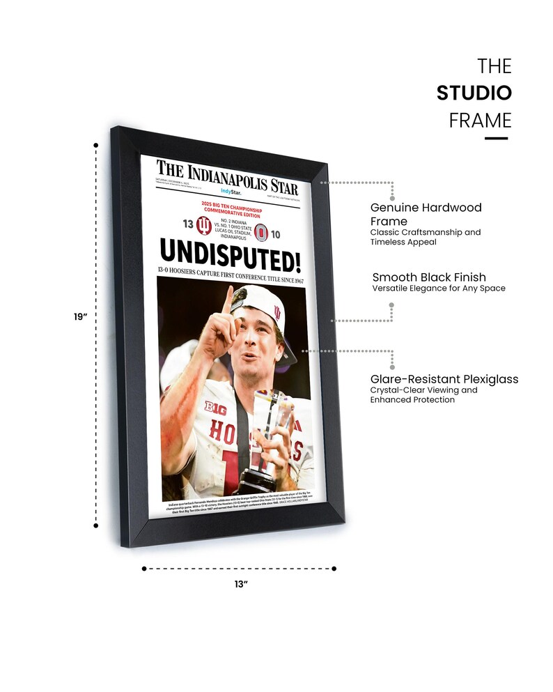 May include: A framed print of The Indianapolis Star newspaper, commemorating a sports victory. The black frame measures 19 inches high and 13 inches wide. The print features a photo of a player holding a trophy, with the headline "UNDISPUTED!"