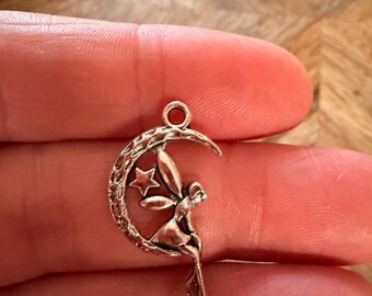 10X fairy on a moon antique silver tone charm