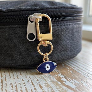 Amuleto para bolso con diseño de mal de ojo / Llavero protector hecho a mano