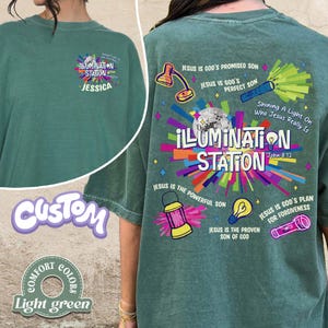 May include: Light green t-shirt with "ILLUMINATION STATION" and "JESSICA" printed on the front. The back features colorful graphics and text including "Jesus is God's Promised Son" and "Shining A Light On Who Jesus Really Is".