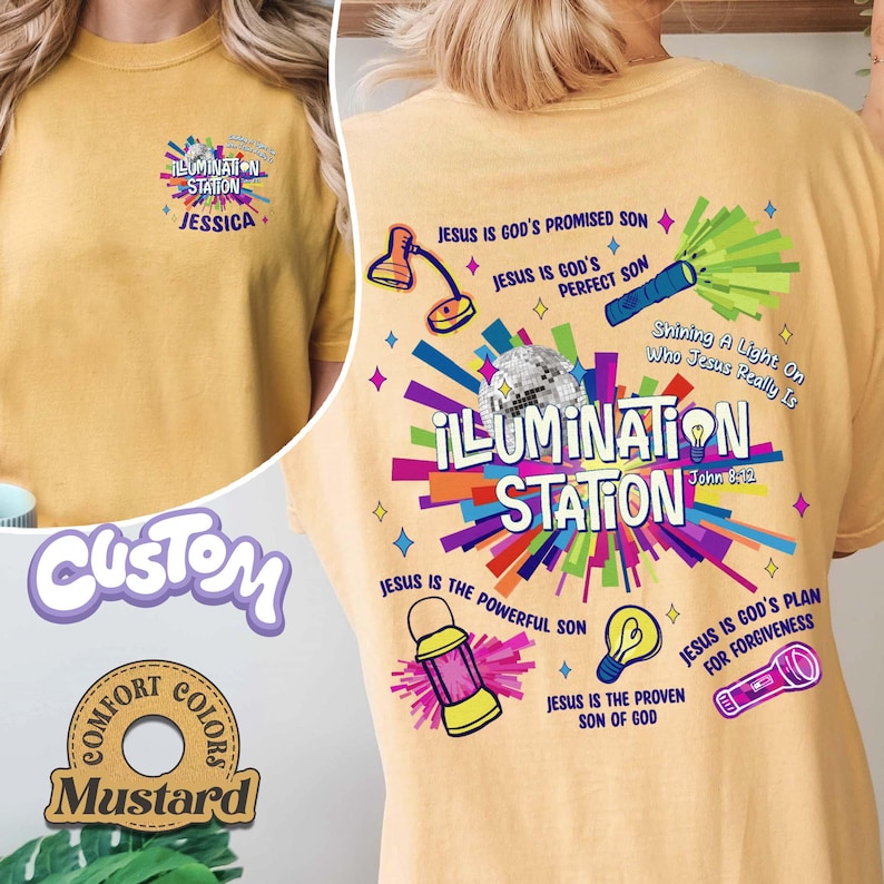 May include: Mustard-colored t-shirt with the text "ILLUMINATION STATION" and various graphics. The back of the shirt features additional text and illustrations, including a disco ball, a lamp, and a flashlight. The shirt also has the text "JESUS IS GOD'S PROMISED SON".