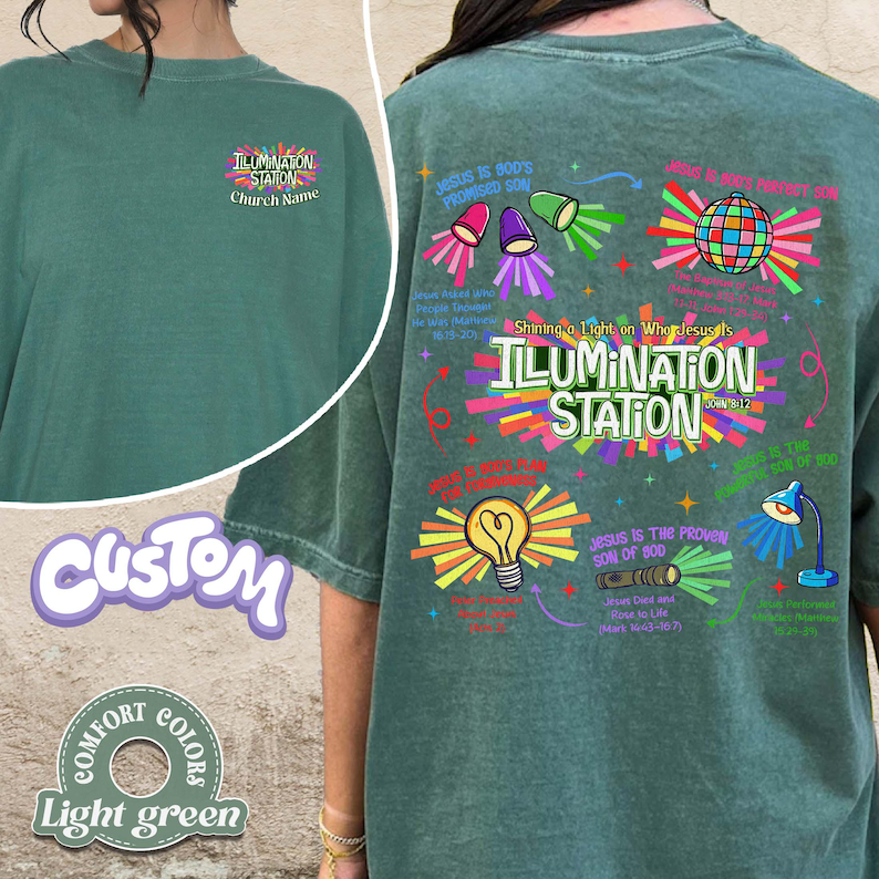 May include: Light green t-shirt with the text "ILLUMINATION STATION" on the front and back. The back of the shirt has colorful graphics and text, including "Jesus Is God's Promised Son" and "Shining a Light on Who Jesus Is."