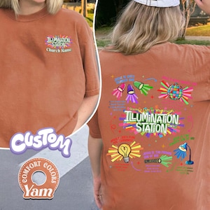 May include: A burnt orange t-shirt with the text "ILLUMINATION STATION" and "Church Name" on the front. The back features colorful graphics, including a disco ball, spotlights, and a lightbulb, with the text "Shining a Light on Who Jesus Is".