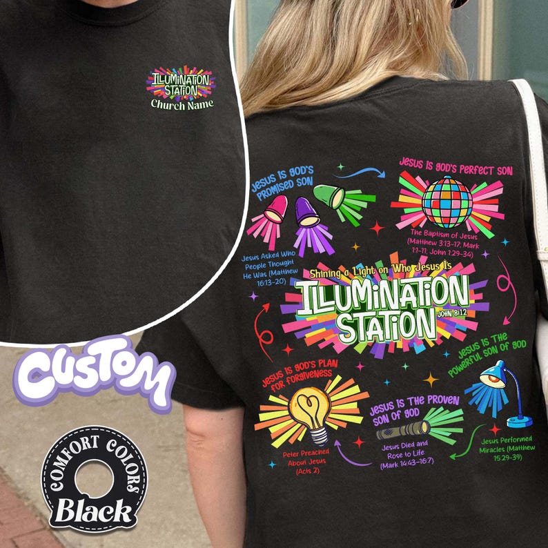 May include: Black t-shirt with a colorful graphic design featuring the text "ILLUMINATION STATION" and religious imagery. The design includes various illustrations and scriptural references, with the word "CUSTOM" and "COMFORT COLORS" printed on the shirt.