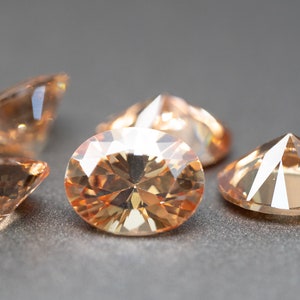 Oval Faceted Champagne CZ - (Champagne/Morganite Cubic Zirconia) various sizes (1 piece)