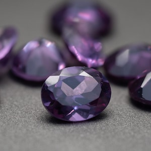 Oval Faceted Imitation Alexandrite - (Synthetic Color Change Corundum) various sizes (1 piece)