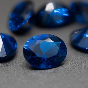 Oval Faceted Sapphire colored Blue Spinel - (Synthetic Spinel) various sizes (1 piece)