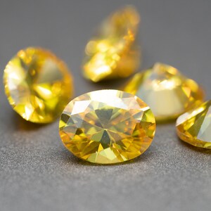 Oval Faceted Yellow CZ - (Yellow Cubic Zirconia) various sizes (1 piece)