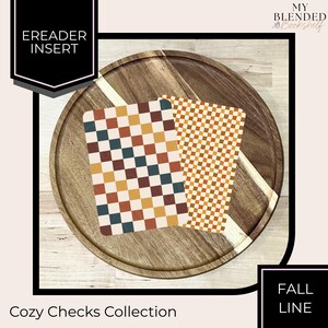 May include: Two rectangular ereader inserts from the Cozy Checks Collection. One features a large checkered pattern in teal, mustard yellow, and brown. The other displays a smaller, dense orange and white checkered grid pattern.
