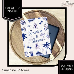 May include: An e-reader insert with a summer theme, featuring the text "Sunshine & Stories." The design includes illustrations of beach elements like sunglasses, palm trees, and a swimsuit. The insert is placed on a wooden tray.