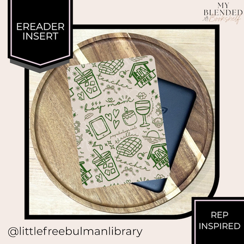 May include: An e-reader insert with a green and white pattern featuring a drink, hearts, and the words "boy mom" and "teacher." The insert is on a wooden tray with a black e-reader. Text on the insert includes "FREE" and "psychological thriller."