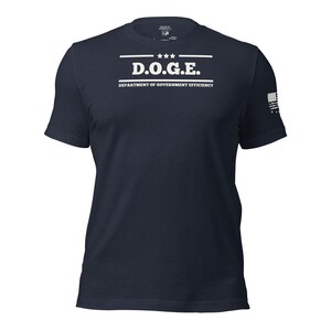 May include: A navy blue t-shirt with white text that reads "D.O.G.E. DEPARTMENT OF GOVERNMENT EFFICIENCY".