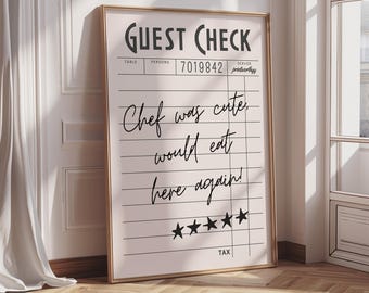 May include: A framed print designed as a guest check, with the words "GUEST CHECK" at the top. The cursive text reads "Chef was cute, would eat here again!". Five stars are visible at the bottom of the print.