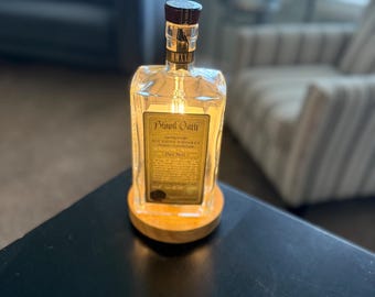 Blood Oath Pact 8 Bourbon Bottle Table Lamp with a dimmer switch