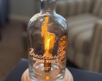 Breckenridge Bourbon Bottle Table Lamp with a dimmer switch