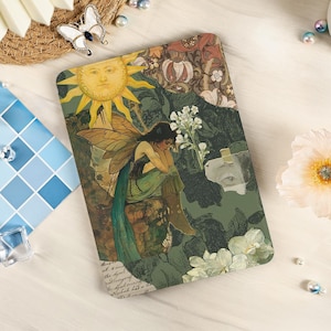 May include: A decorative tablet with a vintage illustration of a fairy, sun, and floral elements. The colour palette includes greens, browns, and yellows. The fairy has wings and is seated. The tablet has a distressed, aged appearance.