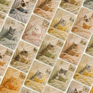 May include: A collection of cards featuring various cats reading books in bed. Each cat is nestled under a blanket with a cup of coffee nearby. The cards have a vintage, pastel aesthetic with soft colors and a cozy atmosphere.