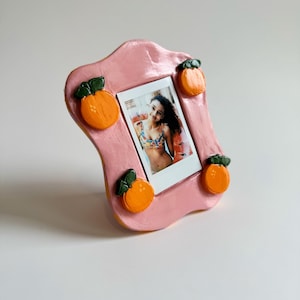 Handmade Clay Photo Frame with Oranges – Pink Polaroid Frame – Whimsical Fruit Decor – Cute Mini Frame
