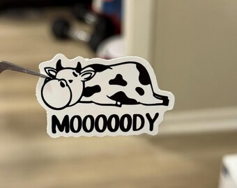 Moooody Cow Sticker – Funny Cute Cow Laying Down Vinyl Decal, Waterproof Animal Sticker for Laptops, Water Bottles, Journals, Cow Lover Gift