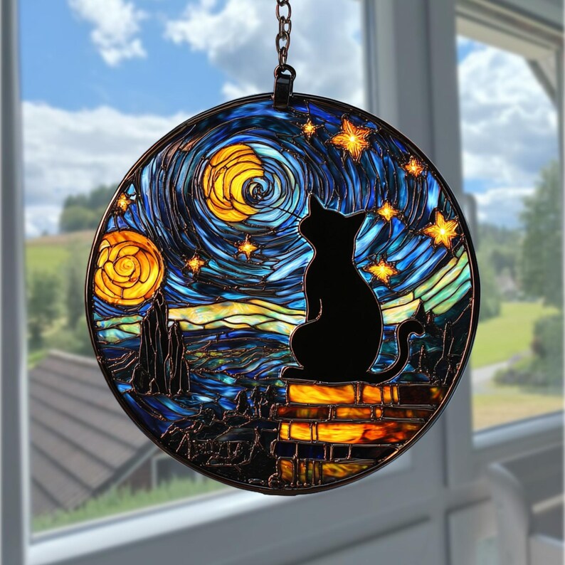 May include: A round stained glass window featuring a black cat silhouette gazing at a starry night sky. The design incorporates swirling blues, yellows, and oranges, reminiscent of Van Gogh's style. The window is framed in a dark metal and hangs from a chain.