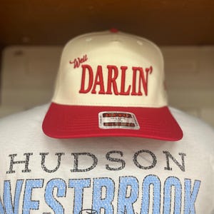 Well Darlin’ Cap – Hudson Westbrook, Otto 5 Panel Cap, Trucker Hat, Puff Embroidery, Sold at Buc-ee’s, Baseball Cap, Red/Natural Cap