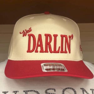 Well Darlin’ Cap – Hudson Westbrook, Otto 5 Panel Cap, Trucker Hat, Puff Embroidery, Sold at Buc-ee’s, Baseball Cap, Red/Natural Cap
