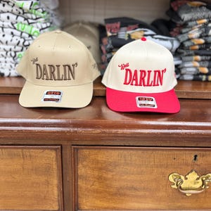 Well Darlin’ Cap – Hudson Westbrook, Otto 5 Panel Cap, Trucker Hat, Puff Embroidery, Sold at Buc-ee’s, Baseball Cap, Red/Natural Cap