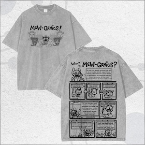Könnte beinhalten: Graues T-Shirt mit dem Text "MEW-GENICS!" und Cartoon-Katzen-Grafiken auf der Vorderseite. Auf der Rückseite befindet sich ein Comicstrip mit dem Text "WHAT IS MEW-GENICS?" und weiteren Katzenillustrationen.