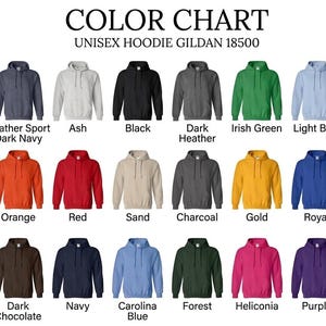 May include: Color chart of Gildan 18500 unisex hoodies in various colors, including white, black, navy, and green. The image displays a range of hues, from light pink to dark chocolate, with the names of each color printed below.
