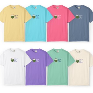 May include: Eight short-sleeved t-shirts in various colors, including yellow, blue, pink, and white. Each shirt features a small graphic of a coconut with the text "Chillin' and Sippin'" in blue.