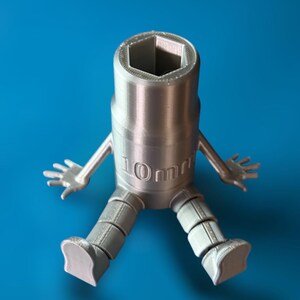 May include: A silver 3D printed wrench with arms and legs. The wrench is 10mm and has a hexagonal opening.