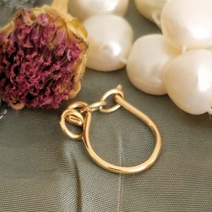 Small charm holder with chain.  Gold filled.