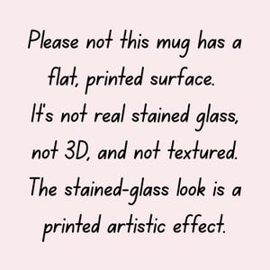 May include: Text on a light pink background reads: "Please not this mug has a flat, printed surface. It's not real stained glass, not 3D, and not textured. The stained-glass look is a printed artistic effect."