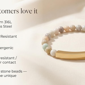 May include: A bracelet with natural stone beads in neutral tones and a gold-coloured rectangular centrepiece. The image includes text highlighting features such as stainless steel and hypoallergenic materials.