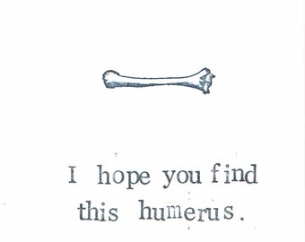 Find This Humerus Card | Funny Skeleton Anatomy Science Medical Humor Bones Gothic Birthday Pun Nerdy Graduation Weird Halloween Card
