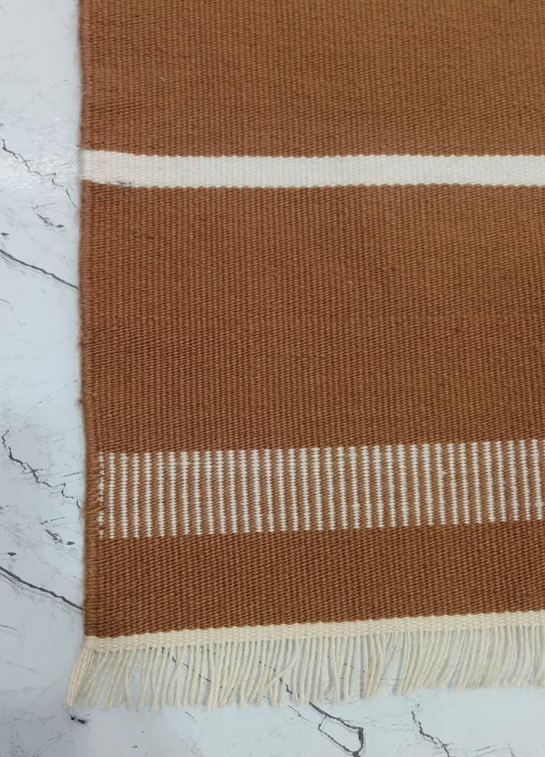 Outdoor setup showing the rug used on a patio or balcony space