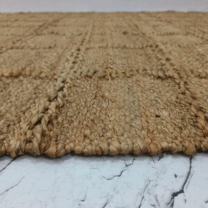 Side angle detail capturing chunky checkered texture.