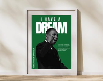 Può includere: Un poster verde con testo bianco che recita "I Have A Dream" e una foto in bianco e nero di Martin Luther King Jr. La citazione "Se non puoi volare, allora corri, se non puoi correre, allora cammina, se non puoi camminare, allora gattona, ma qualunque cosa tu faccia, devi continuare ad andare avanti." è stampata sotto la foto.