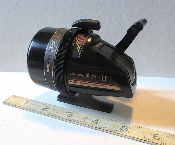 LP122 Shimano FX II Closed Face Spincast Old Vintage Fish Reel Fightin Drag  System Ex Shape These Old Stock Shimano's Are Great 